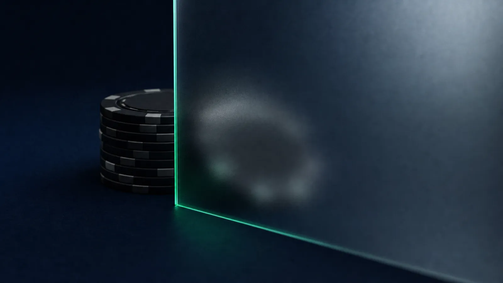 A stack of casino chips held behind a frosted glass barrier